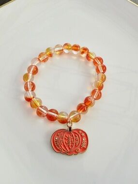 Orange Bead Stretch Bracelet with Pumpkin Charm